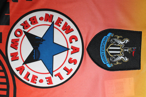 NeWMastle TW Orange Langarm 96/97